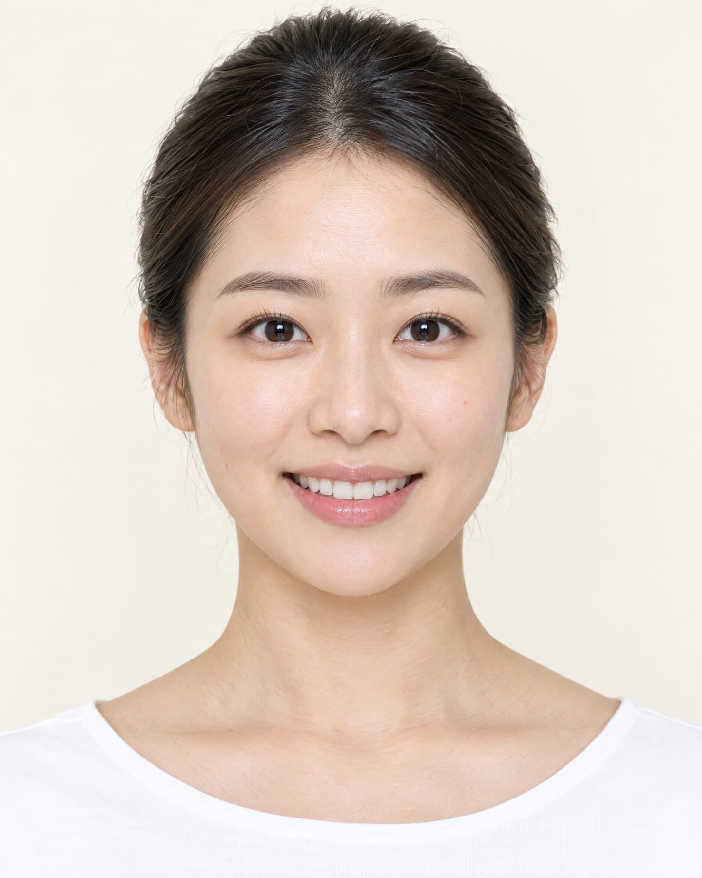 Portrait of a smiling woman with facial reference lines drawn for smile design